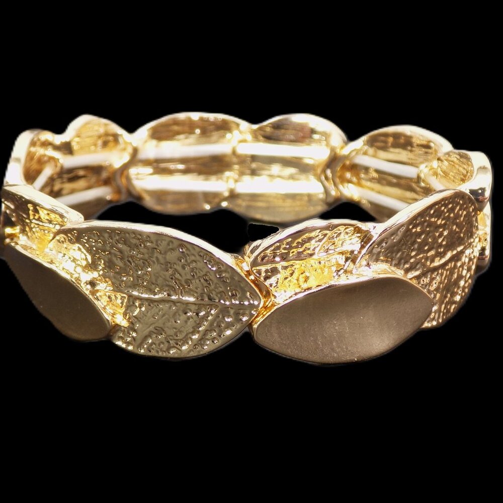 Gold leaves metal stretch bracelet designed with textured leaves all around it